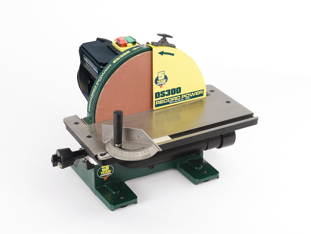 Levigatrice a disco Record Power DS300 con disco in ghisa da 305 mm, piano inclinabile e guida angolare, ideale per finiture precise in falegnameria.